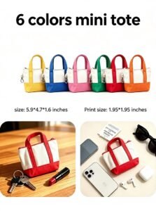 Mini canvas tote pouches with zip top and snap clip in six colorways, shown with keys, lipstick and earbuds for scale